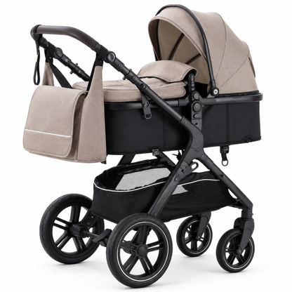 Poussette 3 en 1 Héritage kaki beige, nacelle montée sur châssis noir, vue de trois quarts sur fond blanc