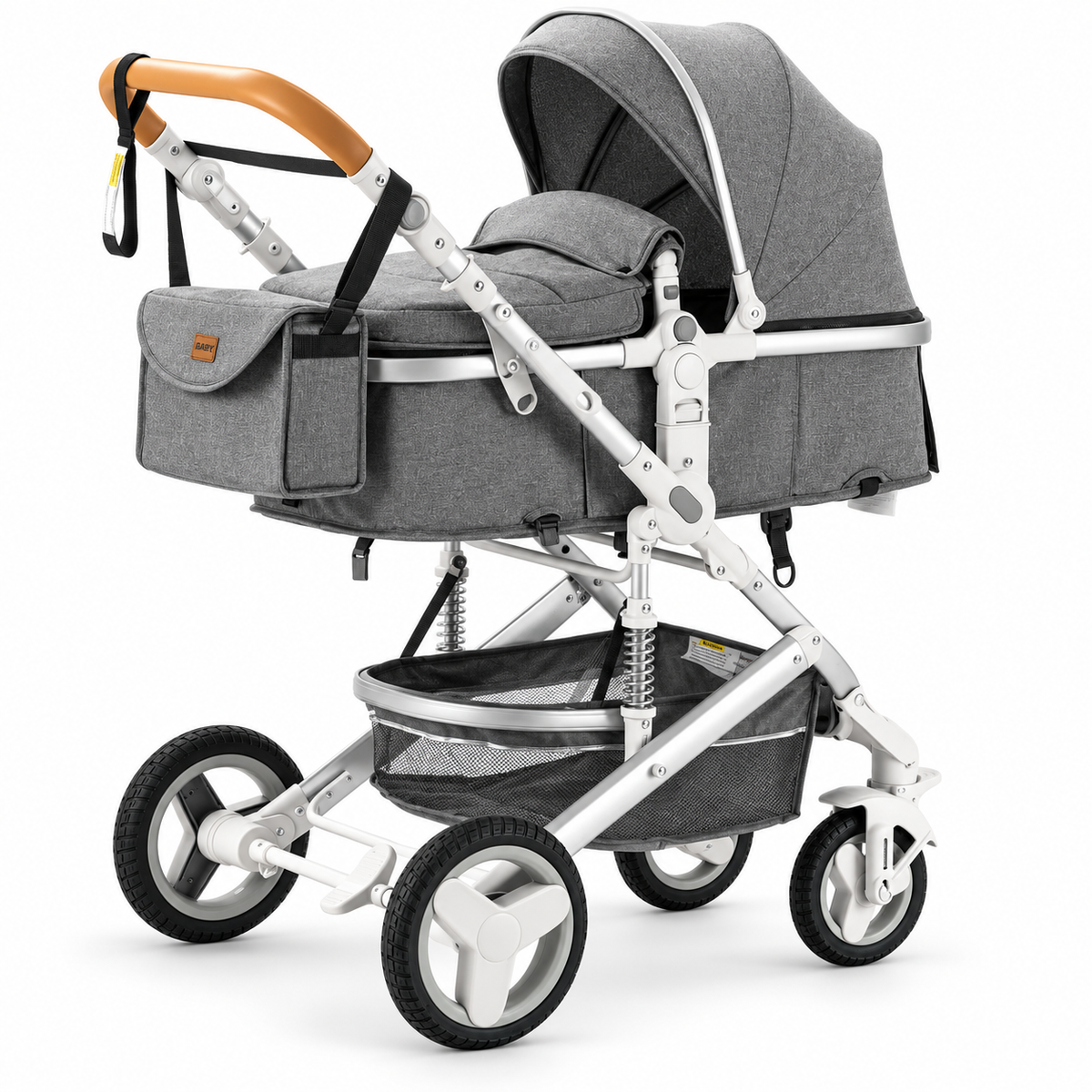 Poussette 3-en-1 Essentielle Amande en coloris gris, nacelle montée sur châssis blanc, vue de trois quarts sur fond blanc