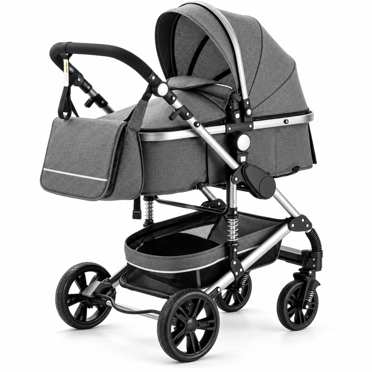 Poussette 3-en-1 Essentielle Anthracite en coloris gris, nacelle montée sur châssis chromé, vue de trois quarts sur fond blanc