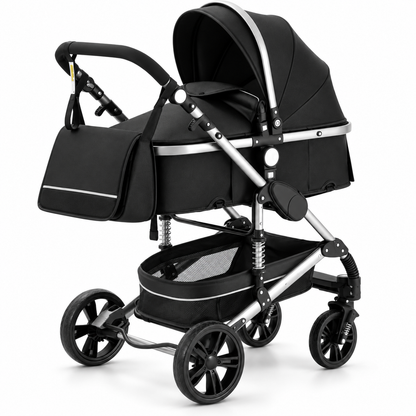 Poussette 3-en-1 Essentielle Prestige noire sur châssis chromé, nacelle montée, vue de profil sur fond blanc
